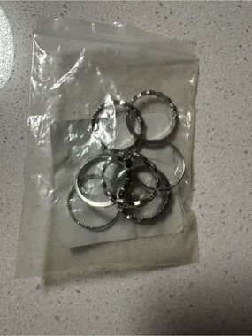 7 pack of Torrid Size 10 rings Silver Tone